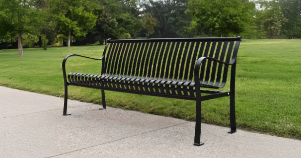 Black metal bench in a park